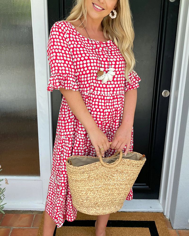 Abito midi con stampa a pois e scollo rotondo