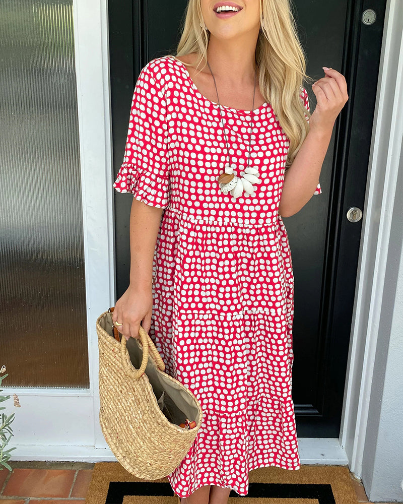 Abito midi con stampa a pois e scollo rotondo