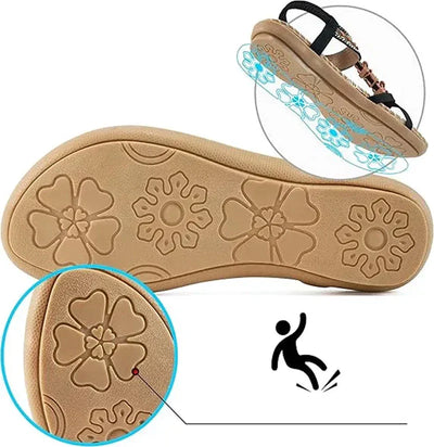 Eleganti sandali decorati con fiori e una farfalla di strass