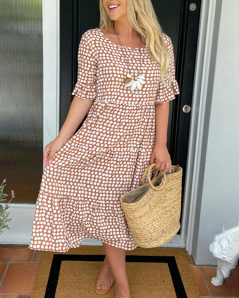 Abito midi con stampa a pois e scollo rotondo