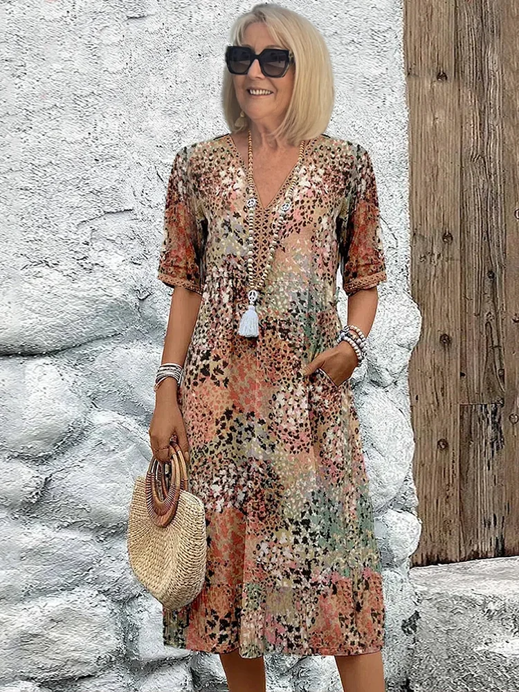 Helen | Elegante maxi-abito con stampa floreale giocosa