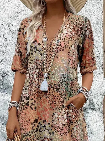 Helen | Elegante maxi-abito con stampa floreale giocosa