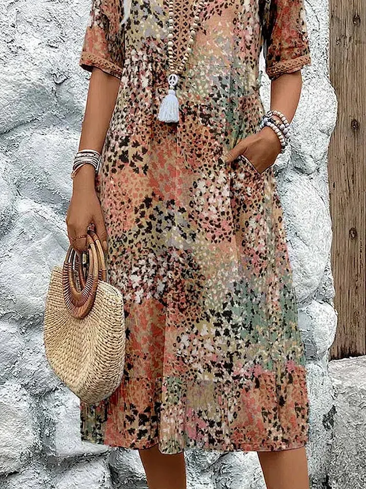 Helen | Elegante maxi-abito con stampa floreale giocosa