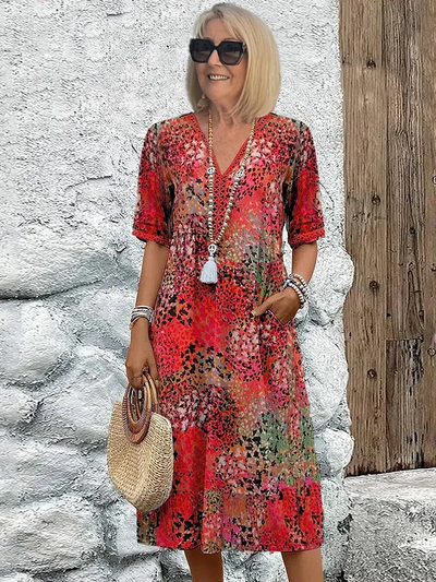 Helen | Elegante maxi-abito con stampa floreale giocosa