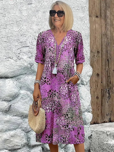 Helen | Elegante maxi-abito con stampa floreale giocosa
